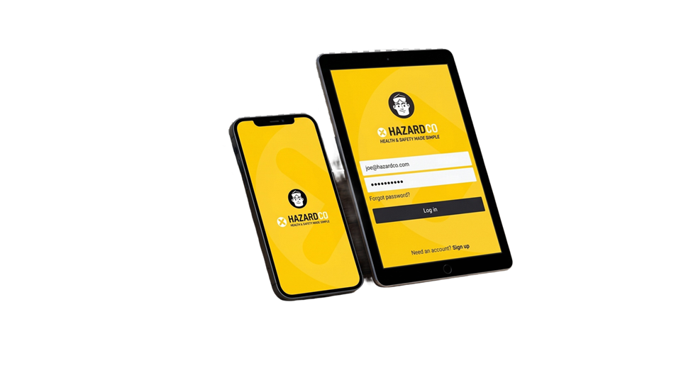 The HazardCo health and safety app open on a phone and tablet resting on a scaffold plank