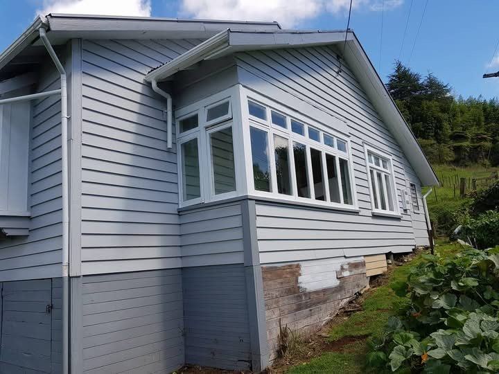 The same house with the scaffold struck and the site left clean